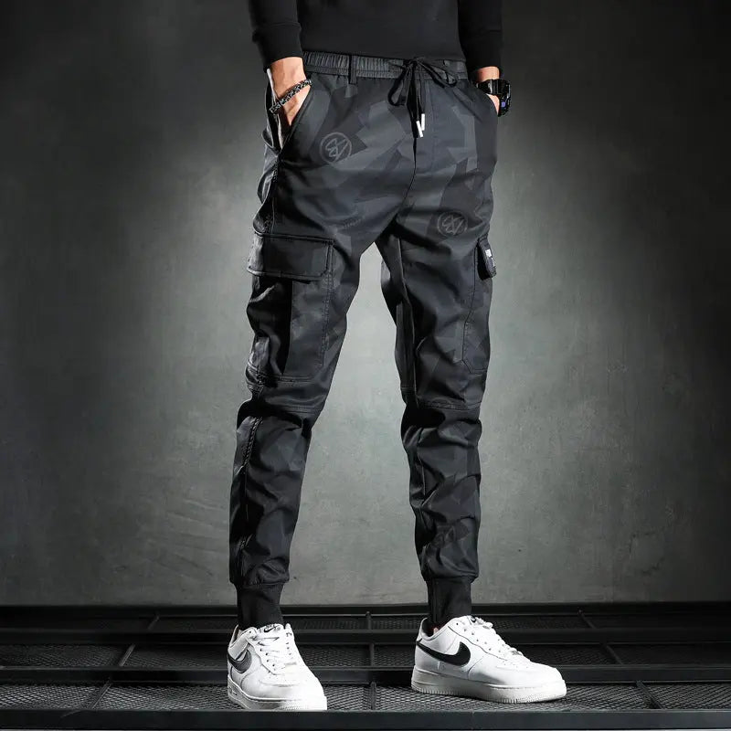 Men's black cargo jogger pants – streetwear style with utility pockets and patch details