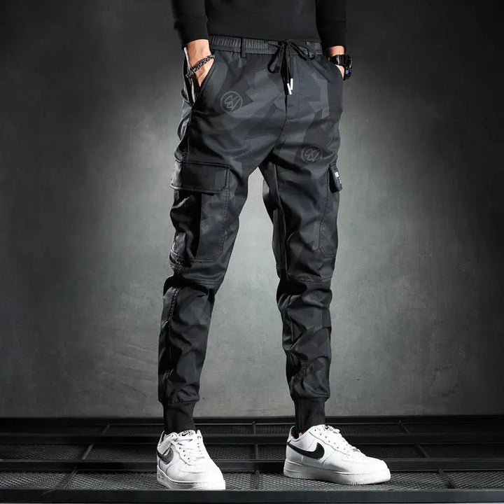 Men's black cargo jogger pants – streetwear style with utility pockets and patch details
