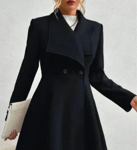 Sleek black women’s winter coat with wide lapels and buttoned closure – perfect blend of sophistication and warmth