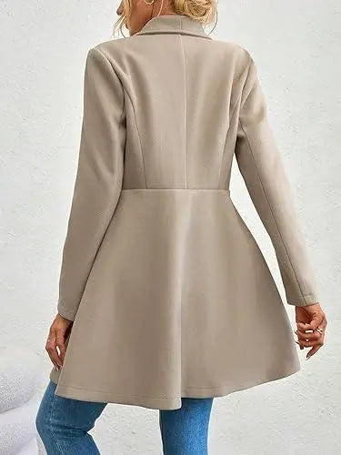 Elegant beige double-breasted long coat for women with oversized collar and fitted waist – stylish outerwear for fall or winter